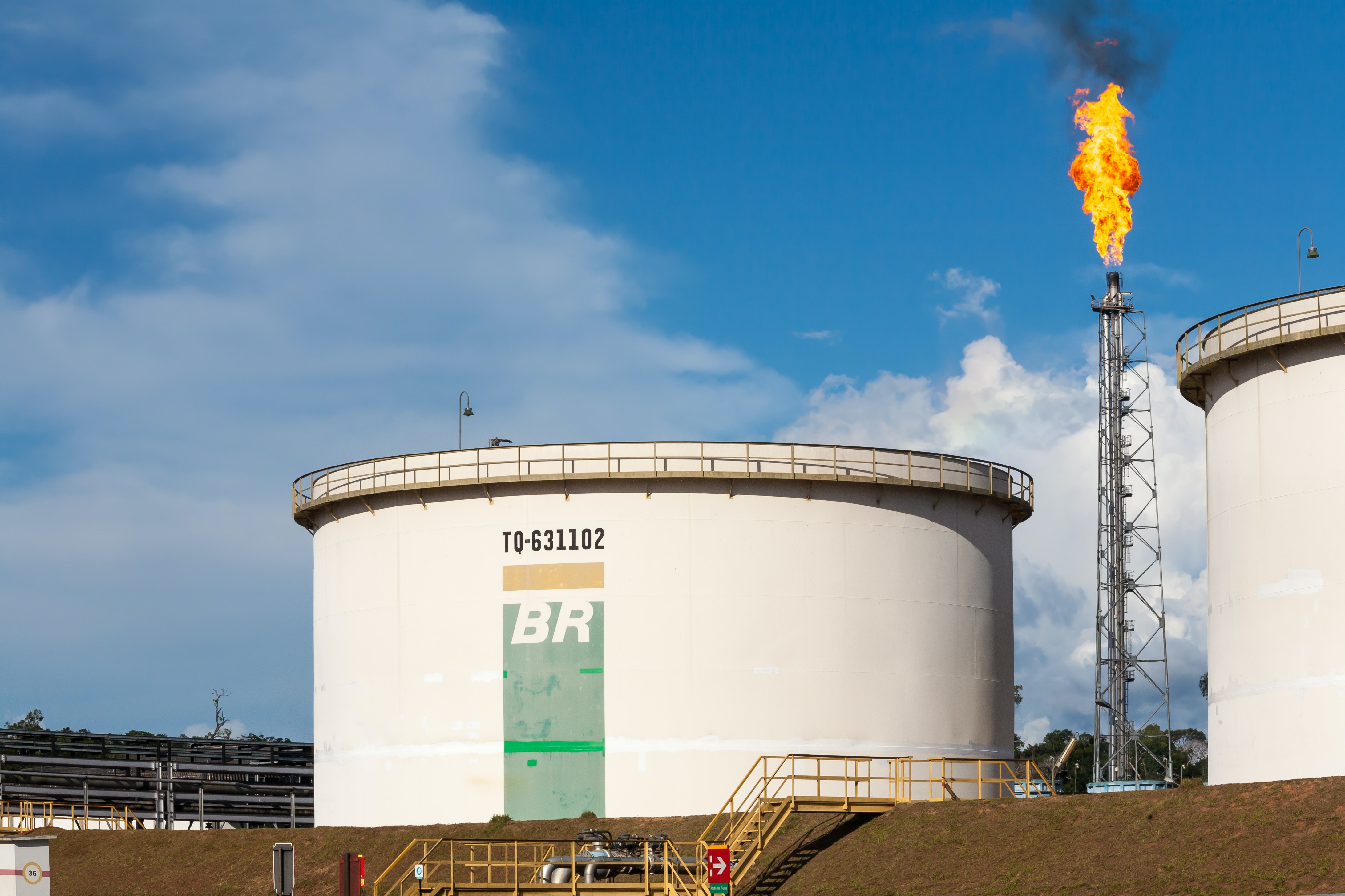 Gas tanks and flare tower owned by Petrobas in Brazil.